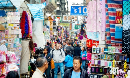 Hong Kong S.A.R. - January 19, 2013: People at flea market in Hong Kong. The flea market in Mong kok district is the most famous flea market in Hong Kong and attract many tourists.のeditorial素材