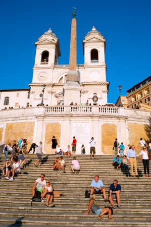 Rome, Italy -  September 27, 2013: Crowd sitting on the Spanish Steps onin Rome, Italy. With 138 steps in total, the Spanish Steps of Rome are the longest and widest outdoor steps in Europe.のeditorial素材
