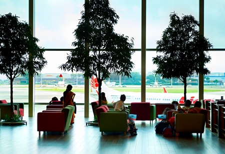Singapore, Republic of Singapore - March 05, 2013  People at a lounge at Changi International Airport  Changi Airport serves more than 100 airlines operating 6,100 weekly flights connecting Singapore to over 220 citiesのeditorial素材