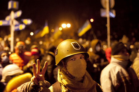 KYIV, UKRAINE - JANUARY 20, 2014: Unidentified man taking part in anti - goverment protests in Kiev, Ukraine.のeditorial素材