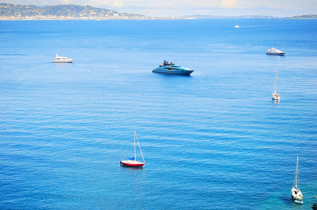 Yachts and boats in sea bay. French Riviera, Azure Coast or Cote d Azur, Provence, France の写真素材