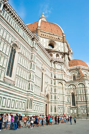 FLORENCE, ITALY - SEPR 08, 2013: People waiting in queue at Cathedral Santa Maria del Fiore in Florence. With r46.1 million tourists a year, Italy is the fifth most visited country in the worldのeditorial素材