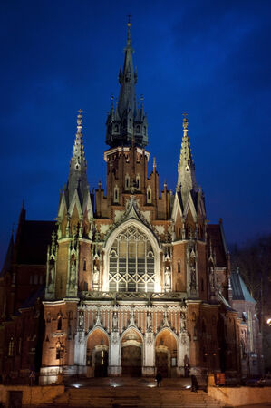 Church of St Joseph - a historic Roman Catholic church in Krakow at dusk, Polandの写真素材