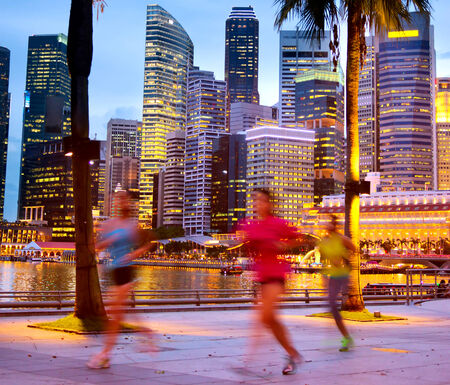 Singapore night life, people jogging in downtown のeditorial素材