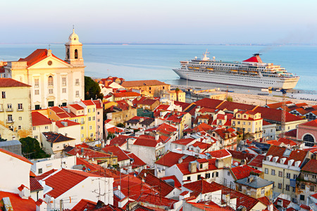 Cruise liner in Lisbon harbor at sunset. Portugalのeditorial素材