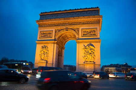 Evening traffic on Paris road near Triumph Arch. Parisの写真素材