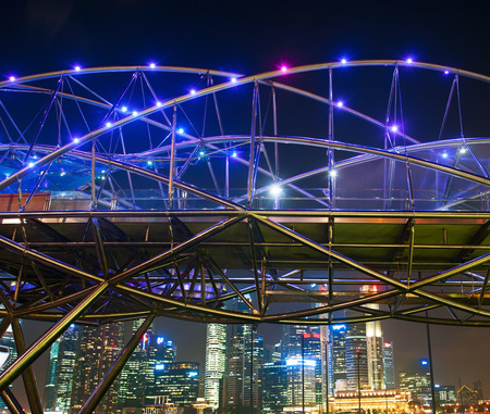 SINGAPORE - MARCH 06, 2013: The Helix Bridge at night  in Singapore. The Helix is fabricated from 650 tonnes of Duplex Stainless Steel and 1000 tonnes of carbon steel.のeditorial素材