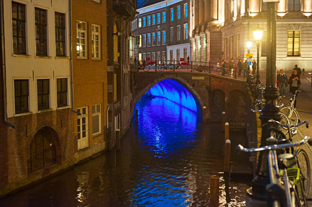 UTRECHT, NETHERLANDS - MARCH 03, 2014: People walking on the old town street in Utrecht. Utrecht's ancient city centre features many buildings from the Early Middle Agesのeditorial素材