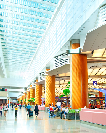 SINGAPORE - MARCH 05, 2013: Modern interior of  Changi International Airport in Singapore. Changi Airport serves more than 100 airlines operating 6,100 weekly flightsのeditorial素材