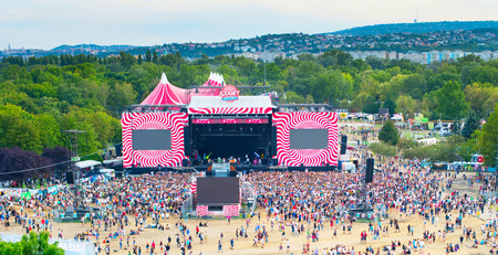 BUDAPEST, HUNGARY - AUGUST 13, 2014: Visitors of Sziget music festival in front of the main stage. Sziget is one of biggest festivals in Europeのeditorial素材