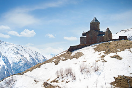 Famous Holy Trinity Church near Stepantsminda village, Georgia