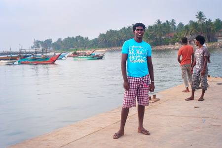 HIKKADUWA, SRI LANKA - FEB 2, 2012: Portrait of a poor Sri Lankan man. About 80 percent of Sri Lanka 's population lives in its rural areas.のeditorial素材