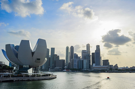 Skyline of Singapore bay with famous Downton Core at sunset.のeditorial素材
