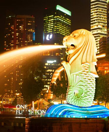 SINGAPORE - MAY 07, 2013:  Merlion fountain at Marina bay in Singapore. Merlion is an imaginary creature with the head of a lion and the body of a fish, used as a mascot of Singapore.のeditorial素材