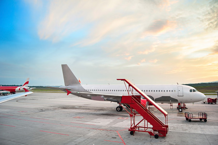 Airplaine at airport in the beautiful sunrise.のeditorial素材