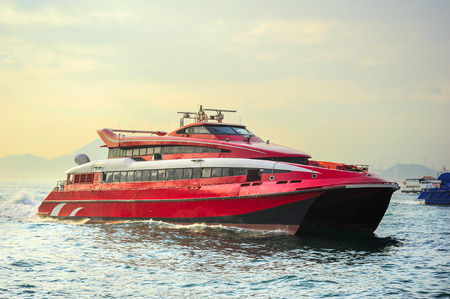 Macao to Hong Kong ferry boats in Hong Kong harborのeditorial素材