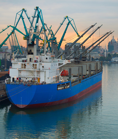 Industrial ship in Batumi comercial port at sunset. Georgiaの写真素材