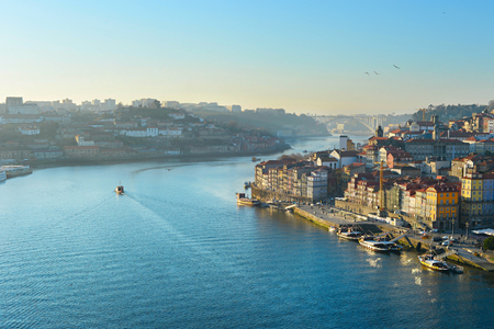 Duoro river and famous Porto architecture in beautiful sunset light. Portugalの写真素材