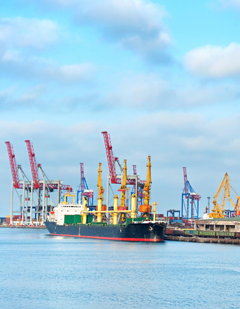 Cargo ship loading in commercial port of Odessa, Ukraineの写真素材