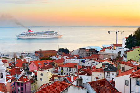 Lisbon Old Town and Cruise liner at sunset, Portugalの写真素材
