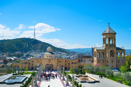 TBILISI, GEORGIA - MAY 06, 2015:Tourists visiting  the Holy Trinity Cathedral of Tbilisi, commonly...