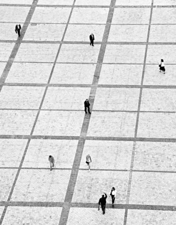 People walking on the Sofiyivsky square in Kiev, Ukraine. motion blurの写真素材