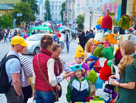 KIEV, UKRAINE - MAY 28, 2016: People at street market on Andrew descent during the Kiev Day. Day of Kiev is a holiday in the Ukrainian capital, usually celebrated in the last weekend of May.のeditorial素材