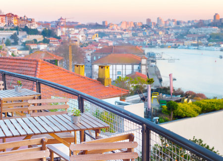 Outdoor restaurant with panoramic view of Porto, Douro river and Villa de Gaia. Portugalの写真素材