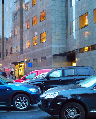 Car parking in downtown of Bucharest at twilight