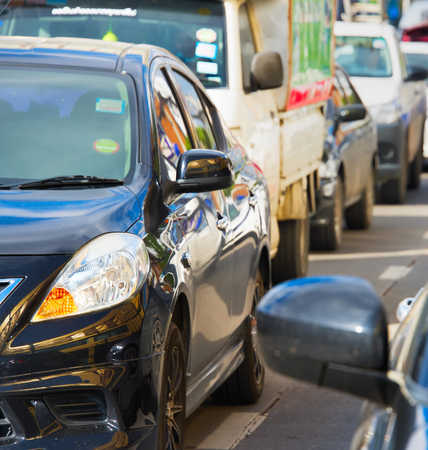 Many cars in a traffic jam in the dayの写真素材