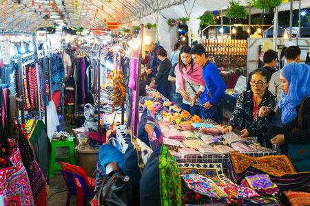 CHIANG MAI, THAILAND - JAN 11, 2017: People at a Night Market in Chiang Mai. Chiang Mai is a second...