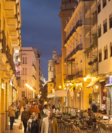 VALENCIA, SPAIN - NOVEMBER 06, 2106: People walking on Old Town street of Valencia. Valencia is the 3rd largest city in Spain.のeditorial素材