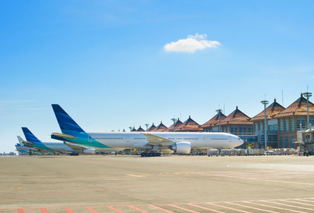 Airplanes at Balinese airport . Bali island, Indonesiaのeditorial素材