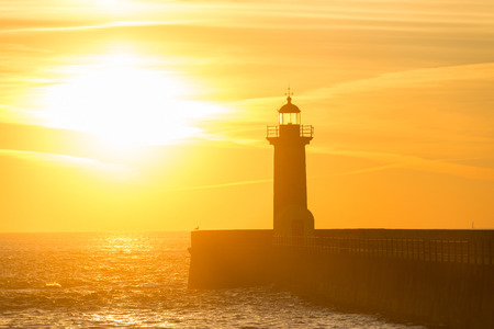 View of lighthouse at sunset. Porto, Portugalの写真素材