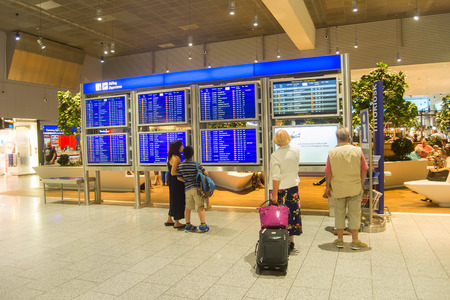 FRANKFURT, AIRPORT - AUGUST 29, 2018: People at departure hall at the Frankfurt International Airport. The airport has two passenger terminals with a capacity of approximately 65 million passengers per yearのeditorial素材