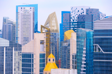 Density of skyscrapers of modern architecture in business district of Singaporeの写真素材