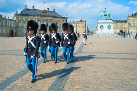 COPENHAGEN, DENMARK - JUNE 14, 2018: Danish Royal Guard marching at square by Amalienborg Palace and Frederic monumentのeditorial素材
