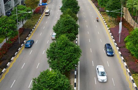 SINGAPORE - FEBRUARY 18, 2017: Cars on a road in Singapore.のeditorial素材