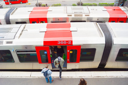 HAMBURG, GERMANY - JUNE 18, 2018: Top view of city public train station, people exiting from wagon