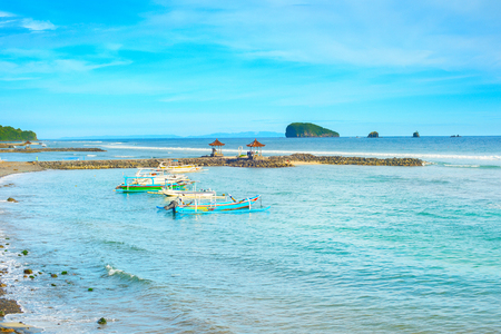 Bali island tropical seascape with traditional boats moored, Indonesiaの写真素材