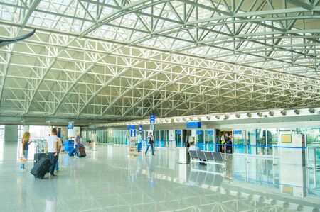 FRANKFURT, GERMANY - AUGUST 29, 2018: People at Frankfurt  airport transit train station. Frankfurt Airport is the busiest airport by passenger traffic in Germany as well as the 4th busiest in Europeのeditorial素材