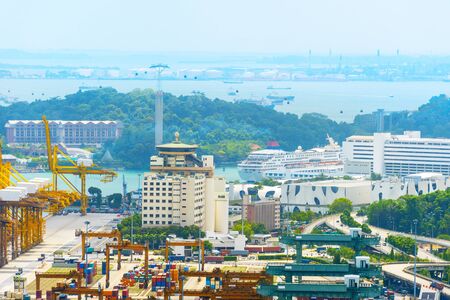 Aerial view of Singapore port, cruise ship and Sentosa island. Singaporeの写真素材