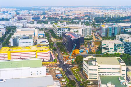 Aerial view of Singapore. Road, business centers, construction siteの写真素材