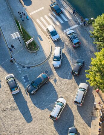 PORTO, PORTUGAL - NOVEMBER 13, 2016: Top view of cars traffic on an Old Town paved road in a morning lightのeditorial素材