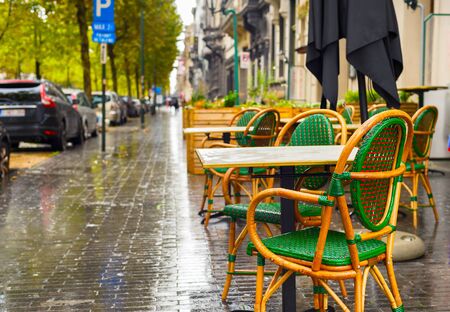 Emty street restaurant in the rainy day. Brussels, Belgiumの写真素材