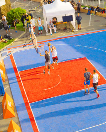 KYIV, UKRAINE - SEPT 14, 2109: Men play basketball on a street. Street ball championship. Aerial viewのeditorial素材
