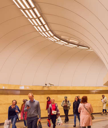 SAINT PETERSBURG, RUSSIA - JULY 11, 2019: Crowd of people walking at metro underpass line change, Saint Petersburg, Russiaのeditorial素材