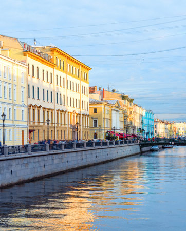 Downtown cityscape, Griboedova street with bridge over canal in sunset light, Saint Petersburg, Russiaのeditorial素材