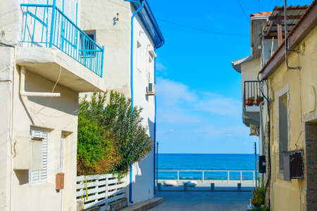 Empty street leading to the sea in Larnaca, Cyprusの写真素材