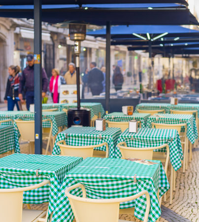 Street restaurant at the Old Town of Lisbon, Portugalの写真素材